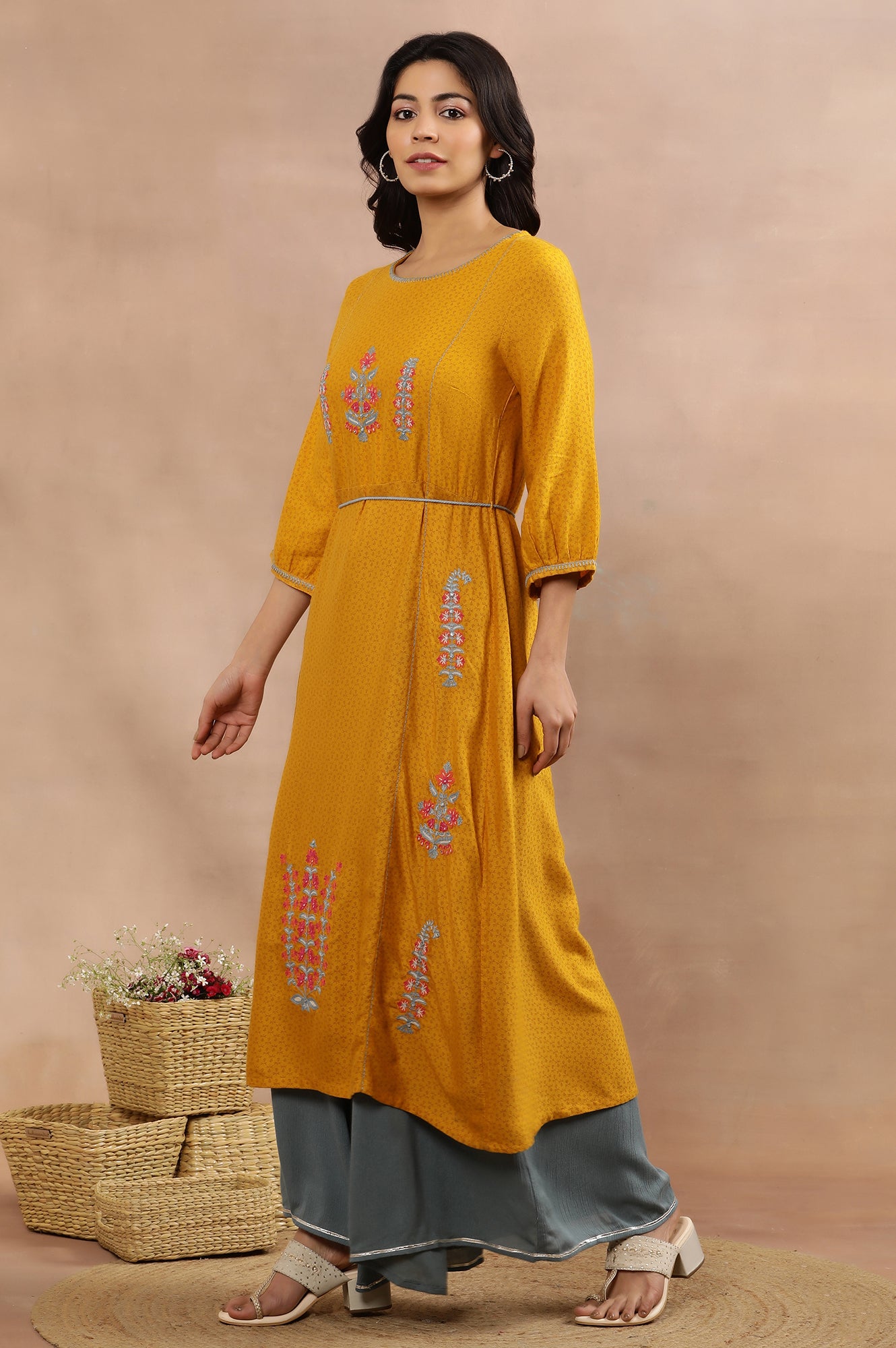 Yellow Embroidered Flared Kurta And Flared Pants Set
