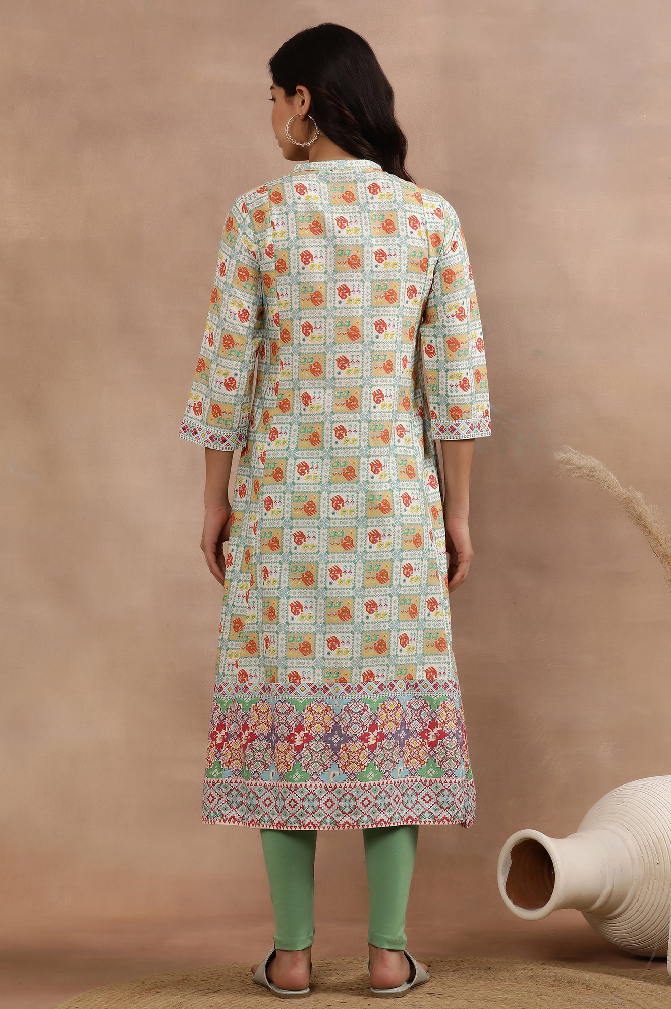 White Flared Kurta With Multi-Coloured Prints And Tights Set