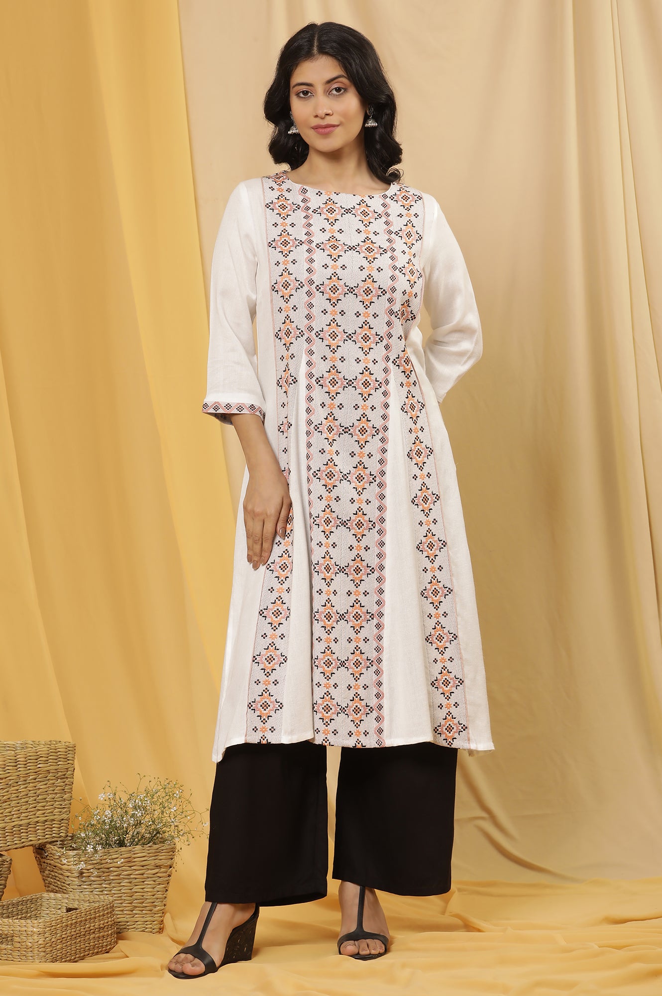 White Printed Kurta And Flared Pants Set