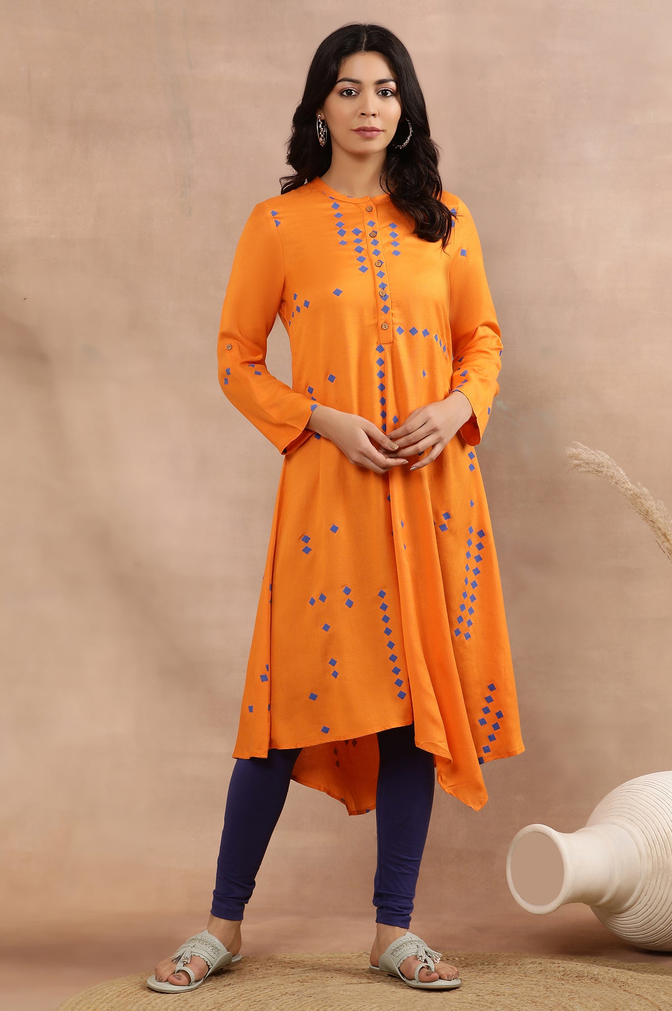 Orange Printed Asymmetrical Kurta And Tights Set