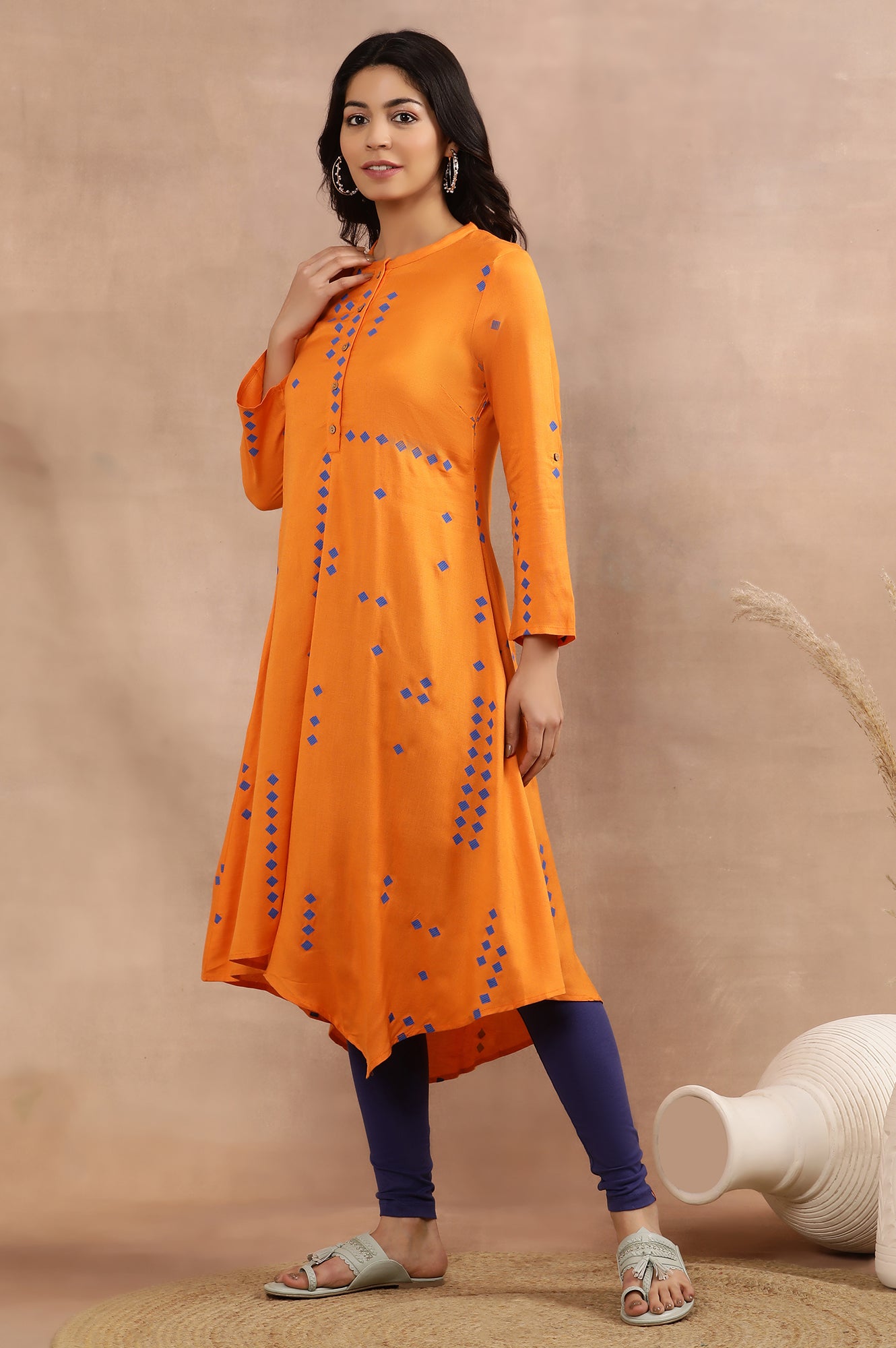 Orange Printed Asymmetrical Kurta And Tights Set