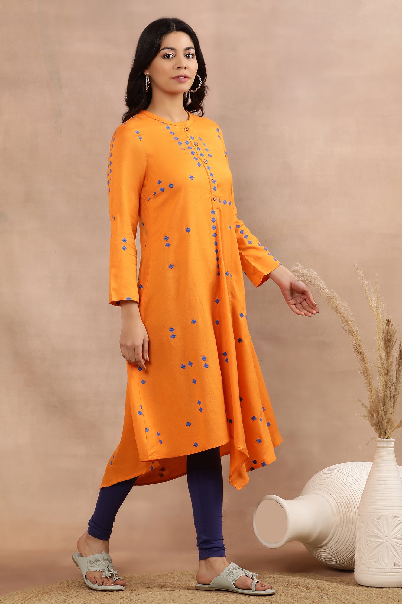 Orange Printed Asymmetrical Kurta And Tights Set