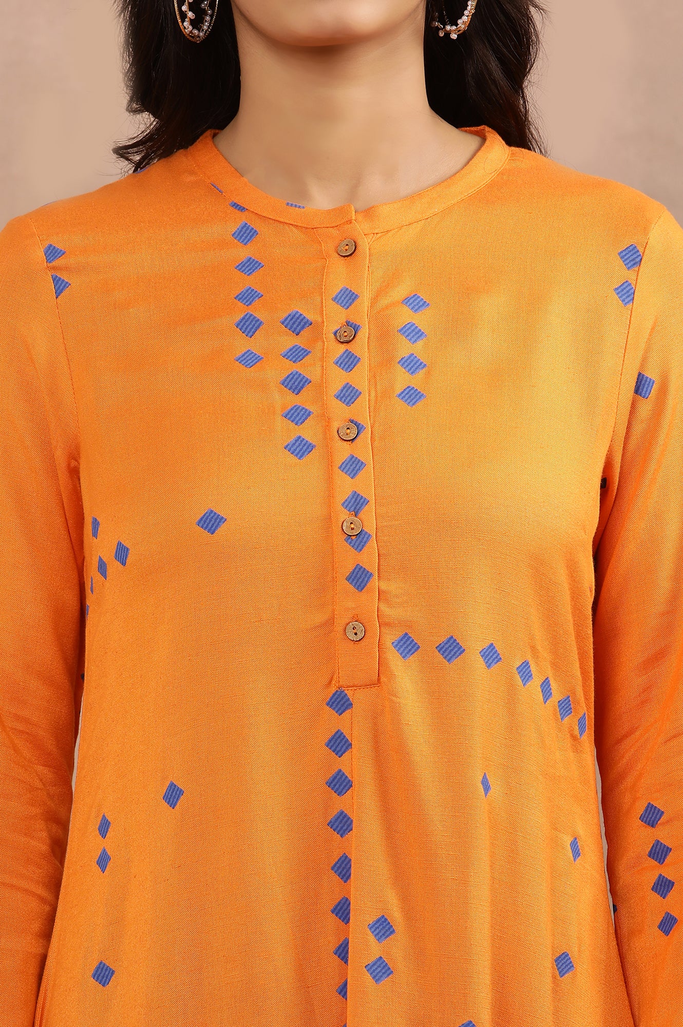 Orange Printed Asymmetrical Kurta And Tights Set