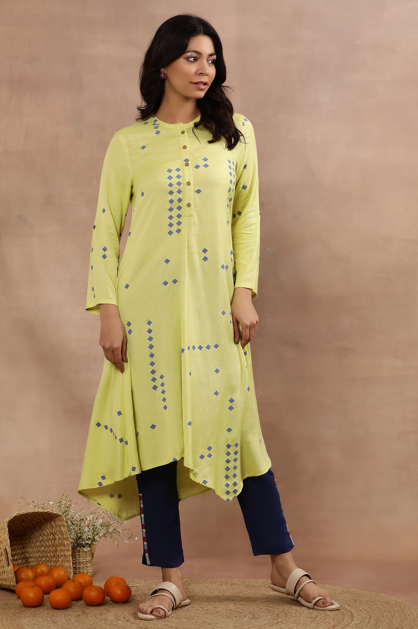 Green Printed Asymmetrical Kurta And Blue Slim Pants Set