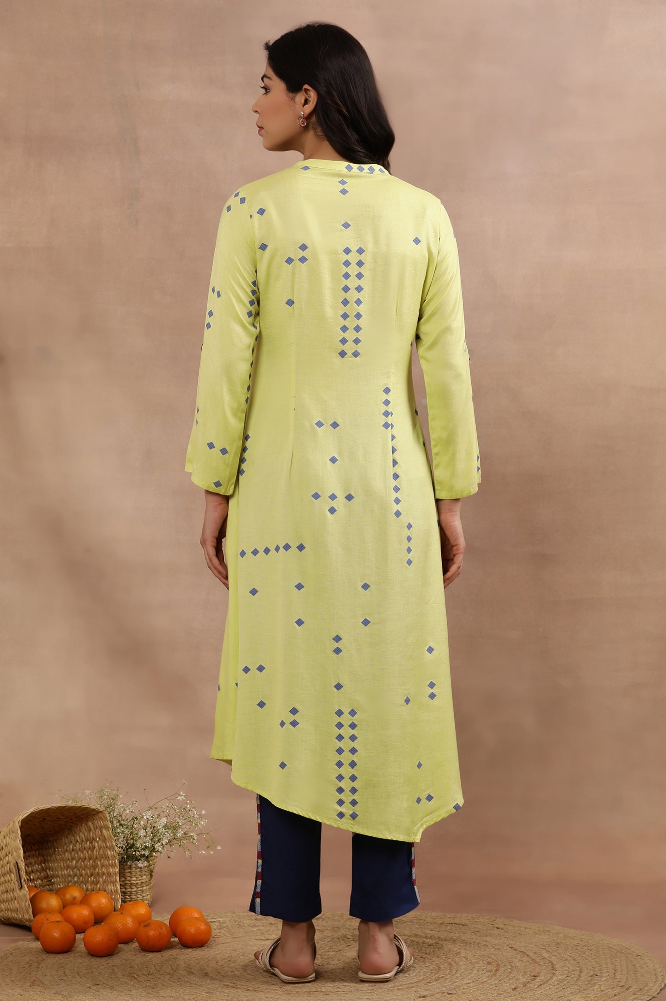 Green Printed Asymmetrical Kurta And Blue Slim Pants Set