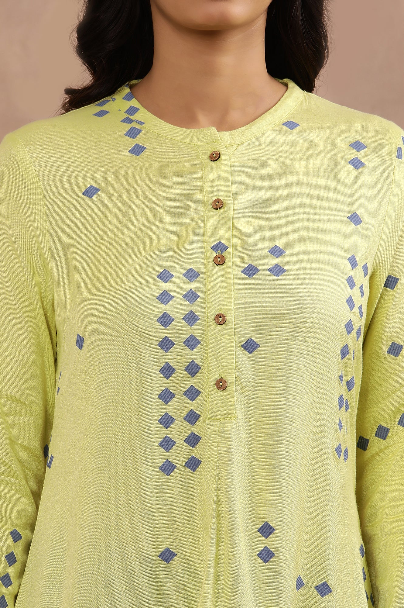 Green Printed Asymmetrical Kurta And Blue Slim Pants Set