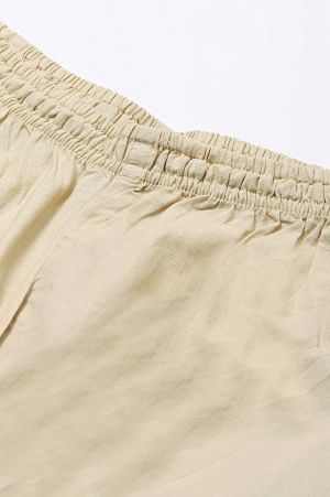 Beige Solid Knitted Churidar