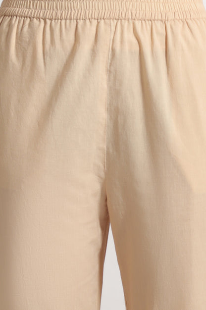 Light Beige Floral Printed Swiss Dot Net Spaghetti Flared Kurta, Pants and Dupatta Set