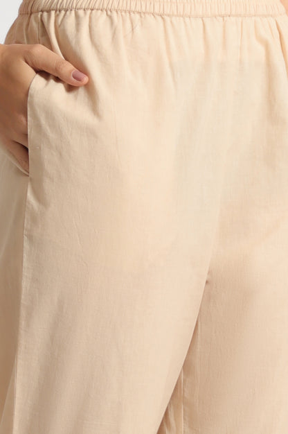 Light Beige Floral Printed Swiss Dot Net Spaghetti Flared Kurta, Pants and Dupatta Set